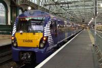 334006 at Glasgow Central on 17 November resplendent in it's new Saltire livery.<br><br>[Graham Morgan 17/11/2010]