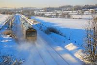 170 401 heads south towards Inverkeithing East Jct on 7 December 2010 leaving snow in its wake.<br>
<br><br>[Bill Roberton 07/12/2010]
