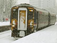 156476 arriving at Pollokshaws West in heavy snow on 6th December on a Glasgow Central service<br><br>[Graham Morgan 06/12/2010]