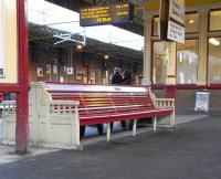 A close up of the venerable bench on the central platforms at Gilmour Street, photographed on 27 November 2010. Generations of people have waited for their trains on it, surely including larking young men in uniform who would never live to sit there in civvies. Makes you think, doesn't it?<br><br>[David Panton 27/11/2010]