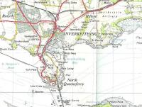 Extract from an OS one inch map published in 1957. It contains a rare representation of the elusive line connecting RNAS Donibristle with the East Ness jetty at Inverkeithing, used to transport seaplanes. The start of the branch and level crossing can be made out, but the next stretch is missing, as are all details of the airbase (and Rosyth Naval Dockyard) for national security reasons. Note that Dalgety Bay was then just that: a bay.[Crown Copyright 1957.]<br>
<br><br>[David Panton //1957]