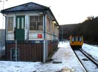 Pacer 142074 passes the redundant junction signal box as it runs into Abercynon on 9 December to form the 15.43 service to Merthyr Tydfil.<br><br>[David Pesterfield 09/12/2010]