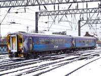 156513 departing from Glasgow Central on 6th December with a Barrhead working.<br><br>[Graham Morgan 06/12/2010]