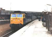 A class 47 at Larbert in the 1980s with a train for Aberdeen.<br><br>[Jim Peebles //]