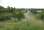 <h4><a href='/locations/B/Bermuda_Park'>Bermuda Park</a></h4><p><small><a href='/companies/C/Coventry_to_Nuneaton_London_and_North_Western_Railway_'>Coventry to Nuneaton (London and North Western Railway) </a></small></p><p>The Bermuda industrial estate has seen a number of measures to reduce carbon emissions - a cycle path, new footpaths, traffic lights on a major roundabout. A new station is scheduled for completion in December 2013 - about where the approaching 153 can be seen in the centre background of this south-facing view. Notice the curve of the road in the foreground - this is the approximate course of the old branch line to the Bermuda collieries. 6/99</p><p>18/06/2010<br><small><a href='/contributors/Ken_Strachan'>Ken Strachan</a></small></p>