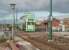 With new platforms under construction in the foreground, tram 762 rumbles across the crossing at Rossall School. 762 is one of the <I>Jubilee</I> class of two trams that were rebuilt with East Lancs bodies and which seemed considerably larger than all the other trams in the fleet. After withdrawal in 2011 it moved to the National Tramway museum at Crich. The large waiting shelter at this tram stop was demolished when the new halt was completed. [See image 22575] for the same view eighteen months earlier.<br><br>[Mark Bartlett 16/10/2010]