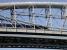 A 125 going east over the Royal Albert Bridge at Saltash on the 3rd of May 2009. Part of the deck of the much newer road bridge is seen directly below Brunel's iconic structure.<br><br>[Neville Davies 03/05/2009]