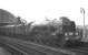 The RCTS <I>'Tyne - Solway Rail Tour'</I> hauled by A1 Pacific no 60131 <I>Osprey</I> takes water at Stockton on 21 March 1965 during a break in its journey from Leeds City to Carlisle via Newcastle.  <br><br>[K A Gray /03/1965]