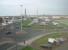 The site of Blackpool Central MPD, as seen from the top floor of nearby Blackpool FC stadium looking towards Blackpool Central station in 2010. Prior to the 1964 closure there were 19 tracks from left to right at this point including a four track mainline, eight road shed and other associated sidings in between. Since the image was taken the car park has closed with housing built on the old shed site. <br><br>[Mark Bartlett 27/10/2010]