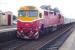 The 07.43 Southern Cross to Eaglehawk train slows for its stop at Gisborne, Vctoria, on 12 October 2010 behind V/line locomotive no N460 'City of Castlemaine'.<br><br>[Colin Miller 12/10/2010]