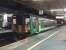 The 18.45 to Nuneaton enjoying a pool of light in Coventry station before heading North on 12 October. Ironic that the smallest train in the station is stabled in platform no 1.<br><br>[Ken Strachan 12/10/2010]