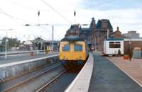 Scene at Ayr station in 1986 showing a Swindon - built DMU on a service to Glasgow Central in platform 1 with another standing at platform 3.<br>
<br><br>[Colin Miller //1986]