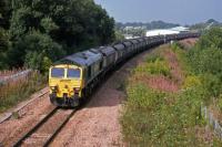 A fond farewell to Kodachrome slide film, the processing of which finally ceased in December 2010 after 75 years. This is one of the last rail images to pass through the sole remaining laboratory in Kansas USA. It shows 66512 heading past Alloa West en route to Longannet power station with its train of coal hoppers in September 2010. <br><br>[Mark Dufton 04/09/2010]