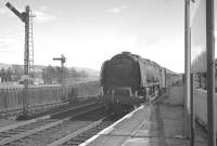 Stanier Coronation Pacific no 46247 <I>City of Liverpool</I> photographed at the south end of Beattock station on 15 April 1963 heading the 10am Euston - Perth train. The train will shortly draw to a halt in order to take on banking assistance. <br><br>[K A Gray 15/04/1963]