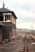 Crew Junction box is in poor shape in this 1966 view, some nine months after closure. Despite appearances, the line from Coltbridge Junction to Leith North (the right hand track) was still open for freight, but would succumb a year later. The name board was subsequently purchased from British Railways by the photographer. <br><br>[Frank Spaven Collection (Courtesy David Spaven) //1966]