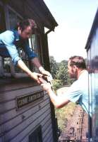 Exchange at Coombe Junction signal box on a Liskeard - Looe service in July 1979.<br><br>[Ian Dinmore 12/07/1979]