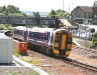 A southbound 158 arrives at Larbert on a bright and sunny afternoon in July 2008. <br><br>[John Furnevel 03/07/2008]