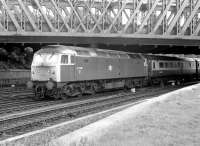 47549 brings a down special under Holgate Bridge and past the old racecourse excursion platform at York in July 1980. The train is about to take the York station avoiding line.<br><br>[John Furnevel 13/07/1980]