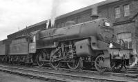 Crab 2-6-0 no 42731 stands in the yard of the now demolished steam shed at Bury (26D). The building behind the locomotive is the electric car shed (now the repair shops of Ian Riley Engineering and the East Lancashire Railway).<br><br>[K A Gray //]