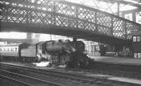 Ivatt 4F 2-6-0 no 43027 arrives at Carlisle platform 4 on 15 May 1964 with the 6.22pm train from Langholm.<br><br>[K A Gray 15/05/1964]