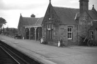 Newtonmore in late 1967 - before the station was destaffed, the main building sold off, the platform shifted eastwards, the loop lifted and the signal box closed. Not much more to 'rationalise' then! [See image 6118]<br>
<br><br>[David Spaven //1967]