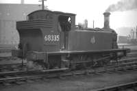 J88 0-6-0ST no 68335 takes a break from shunting Gorgie East yard in 1961. In the right background wooden containers can be seen standing alongside the yard crane.<br><br>[Frank Spaven Collection (Courtesy David Spaven) //1961]