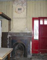 Interior of the wooden station building at King Edward on 22 January 2011. The owner kindly let me grab this shot through a window which shows the original 1872 chimney and fireplace still in situ. [See image 32456.]<br><br>[John Williamson 22/01/2011]