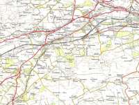 Lines to the west of Falkirk on the OS One Inch map of 1957. All of <br>
the 'solid' rail lines are still there, apart from the short branch to the former Bonnybridge Caledonian terminus [see image 6665], though of the four stations shown only Cumbernauld survives. Cumbernauld had not yet been developed and remained a village at a fork in the road with a station some distance off - so far away in fact that a separate community was building up around it. Crown copyright 1957.<br>
<br><br>[David Panton //1957]