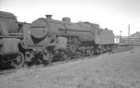 <I>Crab</I> 2-6-0 no 42861 standing amongst the abandoned locomotives in the sidings alongside Ayr shed on 31 July 1966, the precise date of its <I>official</I> withdrawal by BR.<br><br>[K A Gray 31/07/1966]