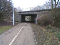 The Leslie branch remained open for goods until 1967, long enough for much of Glenrothes New Town to be built round it and for the line to be bridged (briefly) by new roads. This is the realigned A92 of the mid-1960s, seen here in January 2011. It is the same road and bridge seen (under construction?) in the background of an earlier Railscot photograph [see image 27713] though viewed from the other side.Laverock Avenue is therefore to my left. <br><br>[David Panton 29/01/2011]