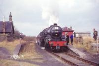 The SLS <I>Scottish Rambler No 3</I> railtour stands at Larkhall East on 29 March 1964 behind <I>Crab</I> 2-6-0 no 42737.<br><br>[Andy Carr Collection 29/03/1964]