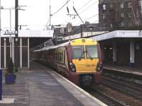 A Helensburgh - Waverley service makes its penultimate stop at Haymarket on 8 February.<br><br>[Brian Forbes 08/02/2011]