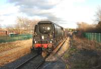 Bulleid <I>Battle of Britain</I> Pacific no 34067 <I>Tangmere</I> approaching Lostock Hall on 10 February 2011 on its second test run following major overhaul. The test was conducted over the <br>
Carnforth-Hellifield-Blackburn-Preston-Carnforth loop with a rake of WCRC coaches and Class 47 no 47760 on the rear.<br>
<br><br>[John McIntyre 10/02/2011]