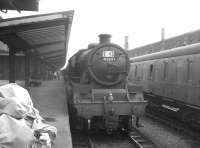 Jubilee 4-6-0 no 45697 <I>Achilles</I> stands alongside Carlisle platform 1 having just brought in train 1S43, a Leicester - Gourock working, on Saturday 7 August 1965.<br><br>[K A Gray 07/08/1965]