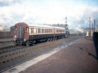 The <I>'Caledonian 123 Excursion'</I>, comprising no 123 (of course) and the preserved ex-Caledonian coaches, leaves Lanark station on 26 April 1958. The special ran to Muirkirk and back at a 2nd class return fare of 2/6d.<br><br>[A Snapper (Courtesy Bruce McCartney) 26/04/1958]