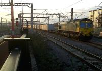 Freightliner 66516 enduring an hour's wait at Rugby on 11 February 2011.<br><br>[Ken Strachan 11/02/2011]