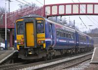 156 496 + 156 493 form the 15.02 Glasgow Central-Edinburgh semi-fast speeding through Curriehill on 17 February.<br>
<br><br>[Bill Roberton 17/02/2011]