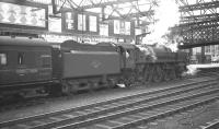 72000 <I>Clan Buchanan</I> stands at Carlisle platform 4 following arrival with the 7.00am from Glasgow Central on 4 August 1962.<br><br>[K A Gray 04/08/1962]