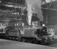 CR123 at Princes Street station, Edinburgh, on 19 April 1965 with the BLS <I>Scottish Rambler No 4</I> (Train A). The special was scheduled to depart at 3.5pm for Carstairs, where it would meet up with ex-GNSR no 49 <I>Gordon Highlander</I> bringing Train B from Leith Central.<br><br>[K A Gray 19/04/1965]