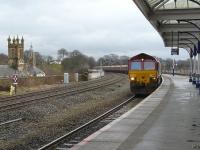 DBS 66119 northbound through Kilmarnock station on 23 February 2011 with the 4S90 Drax - New Cumnock empties heading for Long Lyes.<br><br>[Ken Browne 23/02/2011]