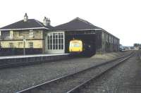 View east at Malton in 1974 with a DMU at the platform. The overall roof was in poor condition and was later demolished, with a replacement canopy coming from Whitby [see image 19600].<br><br>[Ian Dinmore //1974]