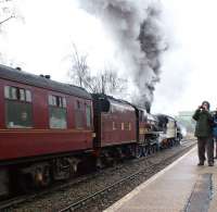 The Railway Touring Company <I>Buxton Spa Express</I> hauled by Black 5 44871 + Jubilee 5690 <I>Leander</I> working hard through Chapel-en-le-Frith station on the climb towards Dove Holes on 26 February with the outward leg of the tour. <br>
<br><br>[John McIntyre 26/02/2011]
