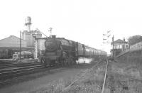 Black 5 no 44796 slows past Larbert North signal box on the approach to the station with an arrival from the north on 25 July 1966. It will depart Larbert as the 6.43pm to Glasgow Buchanan Street. <br><br>[K A Gray 25/07/1966]