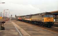 Class 47 no 47234 brings up the rear of a convoy of five of the class, in five different liveries, heading north through Oxford in September 1991.<br>
<br><br>[John McIntyre /09/1991]