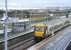 The 11.57 service to Helensburgh Central (11.21 ex-Edinburgh Waverley) pulls into platform 2 at Blackridge on 13 January 2011. Note the old formation running across the centre of the photograph, which once carried a mineral line from Woodend Junction (located just out of shot in the right background) serving Blackrigg No 2 Colliery. [See image 32303]  <br>
<br><br>[John Furnevel /01/2011]