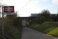 An afternoon Norwich to Sheringham service leaves Gunton station on the Bittern Line in April 2003<br><br>[Ian Dinmore /04/2003]