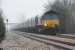 Northbound 4E66, (coke empties from Margam to Redcar), approaches Homedown Level Crossing running about 50 minutes late. <br><br>[Ewan Crawford 18/02/2011]