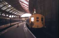 Looking back along the platform towards the buffer stops and concourse at Brighton in November 1991 as 4-CIG and 2-HAP units await their departure times under the the station's overall roof.<br><br>[Ian Dinmore /11/1991]