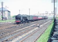 View east from alongside Saughton Junction in June 1958 as A2 Pacific no 60509 <I>Waverley</I> approaches with a motley collection of coaching stock heading for the Forth Bridge.<br><br>[A Snapper (Courtesy Bruce McCartney) 23/06/1958]