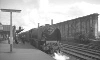 Stanier Pacific no 46244 <i>King George VI</i> stands at platform 1 at Carlisle on 24 August 1963. The locomotive has just taken over the 10am ex-Euston which it will shortly take forward on its journey to Perth.<br><br>[K A Gray 24/08/1963]